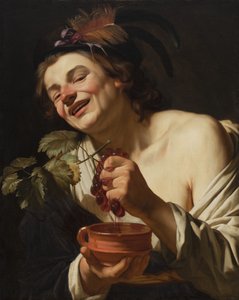 Uśmiechnięty młody mężczyzna ściskający winogrona, 1622 r autorstwa Gerrit van Honthorst