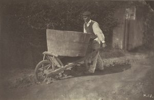 Chłop mężczyzna z taczką, 1870 r.
