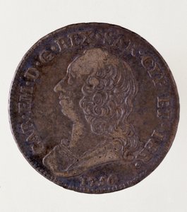 Srebrna moneta włoska (pół ecu) z Królestwa Sardynii: Panowanie Karola Emanuela III Sabaudzkiego (1701-1773). 1756. Średnica. 3,7 cm Neapol, muzeum archeologiczne autorstwa Italian School