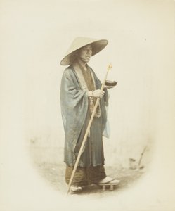 Japończyk w tradycyjnym stroju (ręcznie kolorowane czarno-białe zdjęcie) autorstwa Japanese Photographer