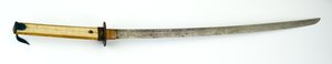 Katana, czyli miecz (stal, miedź, mosiądz, skóra płaszczkowa, drewno i tkanina) autorstwa Japanese School