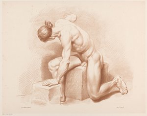 Siedzący nagi mężczyzna
