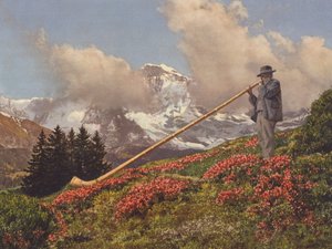 Szwajcaria: Dmuchawa z rogów alpejskich, w tle Jungfrau (kolorowe zdjęcie)
