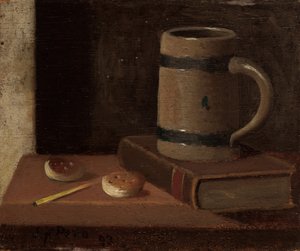 Kubek, książka, ciastka i zapałka