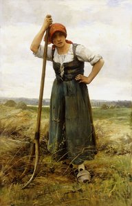 Wieśniaczka oparta o widły,