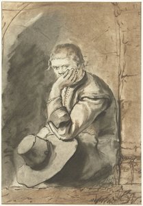 siedzący mężczyzna