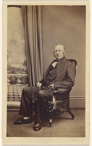 [Niezidentyfikowany mężczyzna w średnim wieku, siedzący]. autorstwa Lloyd and Jefferson