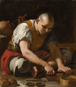 Mężczyzna krojący tytoń autorstwa Mattia Preti