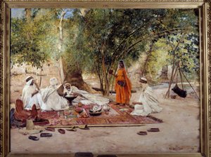 Orientalizm: „”posiłek gościnności””” Scena życia arabskiego w oazie Chelma koło Biskiry w Algierii. Obraz Maurice