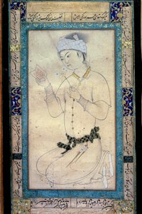 Młody człowiek z książkami i narcyzami perska miniatura w gwaszu Muhammada Szejka autorstwa Muhammad Shaykh
