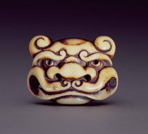 Netsuke przedstawiający twarz demona oni, ok. 1870 (poroże jelenia)