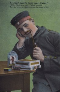 Niemiecki żołnierz palący fajkę (kolorowe zdjęcie) autorstwa Photographer German