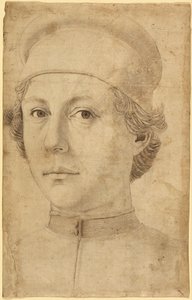 Portret młodego mężczyzny z głową i ramionami w czapce