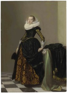 Portret bogato ubranej młodej damy, całej długości, przed udrapowanym stołem autorstwa Pieter Codde