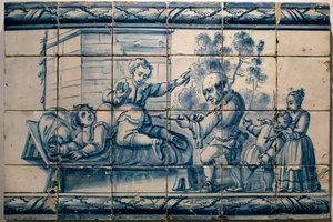 Lekarz wykonujący lewatywę pacjentowi - Panel satyryczny Lizbony, pierwsza połowa XVIII wieku (Lekarz - Panel satyryczny, pierwsza połowa XVIII wieku) - Musee national des azulejos, Lizbona (Portugalia)