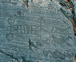 Prehistoria: Cywilizacja Camunni: rydwan napędzany przez konie, koła są przedstawiane ze szprychami, a konie są profilowane w celu poszukiwania. Grawer naskalny skały 23 firmy Naquane (Valcamonica, Val Camonica, Brescia). Okres między neolitem a Bro autorstwa Prehistoric Prehistoric