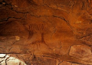 Prehistoria: malowanie ścian. Epoka kamienia 5000-2000 p.n.e. Taghit, Hoggar Highland (Ahaggar), Algieria autorstwa Prehistoric Prehistoric