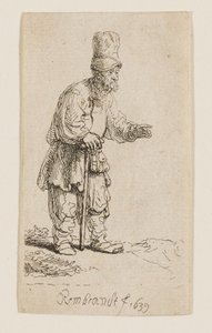 Chłop w wysokiej czapce, stojący i oparty na kiju autorstwa Rembrandt van Rijn