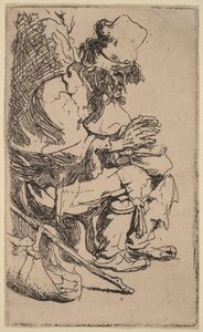 Żebrak siedzący i ogrzewający ręce przy podgrzewaczu do potraw autorstwa Rembrandt van Rijn
