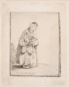 Żebraczka opierająca się na lasce autorstwa Rembrandt van Rijn