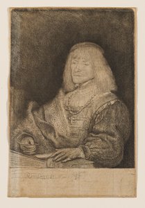 Mężczyzna przy biurku, noszący krzyż na łańcuszku autorstwa Rembrandt van Rijn