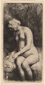 Nude siedzący na ławce z poduszką (kobieta kąpiąca stopy w potoku) autorstwa Rembrandt van Rijn