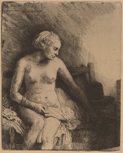 Kobieta w wannie z kapeluszem obok niej autorstwa Rembrandt van Rijn