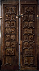 Sztuka romańska: drewniane drzwi z połowy XII wieku kościoła Mariackiego Kapitolu w Kolonii, Niemcy (Sankt Maria im Kapitol, Koln) autorstwa Romanesque