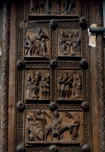 Sztuka romańska: drewniane drzwi z połowy XII wieku kościoła Mariackiego Kapitolu w Kolonii, Niemcy (Sankt Maria im Kapitol, Koln). Sceny przedstawiające zapowiedź pasterzom, szopkę, adorację magów i autorstwa Romanesque
