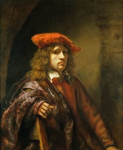 Portret młodego mężczyzny w czerwonej czapce