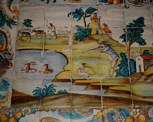 Płytki Azulejos przedstawiające myśliwego strzelającego do jelenia (ceramiczne) autorstwa School Spanish