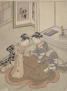 Dwie młode kobiety siedzące przy kotatsu bawiącym się w kociej kołysce, ca. 1765 r., ok. 1765 r. 1765. autorstwa Suzuki Harunobu