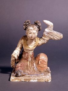 Statuetka przedstawiająca kobietę w tradycyjnym stroju z dynastii Tang (lub T