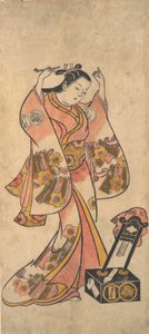 Sanjo Kantaro jako kobieta układająca włosy przed lustrem lakieru, przed 1763 r. autorstwa Torii Kiyomasu II.