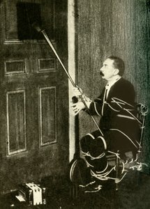 John Nevil Maskelyne wykonuje iluzję szafy duchowej, c1910. autorstwa Unbekannt