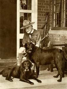 Robert Baden-Powell w domu ze swoimi psami, ok. 1929, 1935. autorstwa Unbekannt