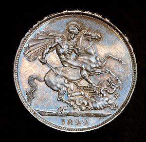 Rzadka moneta brytyjska, król Jerzy IV, srebrna korona Proof, patron Anglii na koniu z mieczem, który ma zabić smoka, autor: Bernedetto Pistrucci autorstwa Unbekannter Künstler