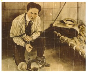 Harry Houdini c.1898 (zdjęcie w sepii) autorstwa Unknown