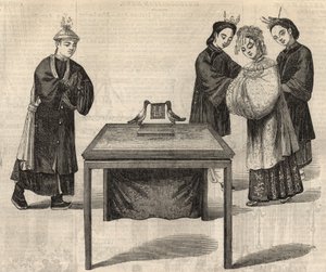 Chiński zwyczaj: podpisanie kontraktu małżeńskiego. Tabliczka z imionami małżonków leży na stole z dwoma gołębiami. Grawerowanie w „The Illustrated London News”” z 14 lutego 1857 r. autorstwa Unknown artist
