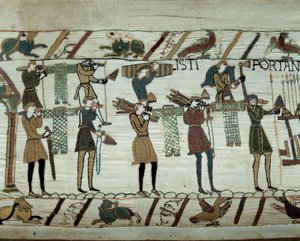 Broń i wino są sprowadzane na statki podczas tankowania na podbój Anglii przez floty Wilhelma Zdobywcy (1027-1087) w 1066 r. Fragment gobelinu z Bayeux lub Haftu królowej Matyldy autorstwa Unknown artist