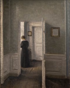 Wnętrze ze stojącą kobietą (olej na płótnie) autorstwa Vilhelm Hammershoi