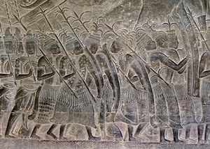 Angkor Wat, Angkor, Kambodża Początek XII wieku z późniejszymi dodatkami. Ten szczegół płaskorzeźb w galerii przedstawia ludność Tajlandii maszerującą jako sojusznik armii Khmerów