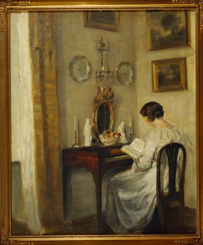 Wnętrze z dziewczyną czytającą przy biurku (olej na płótnie) autorstwa Carl Holsoe