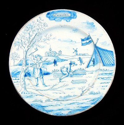 Tabliczka Delftware przedstawiająca miesiąc grudzień (ceramika glazurowana cyną) autorstwa Dutch School