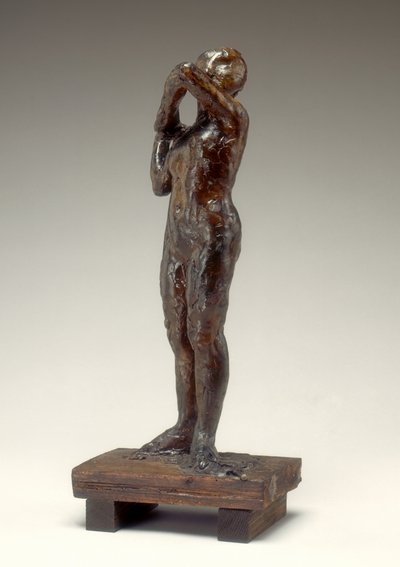 Tancerka dopasowująca pasek na ramię swojego gorsetu, lata 1880-1890. autorstwa Edgar Degas