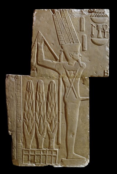 Płaskorzeźba boga Min (wapień) autorstwa Egyptian