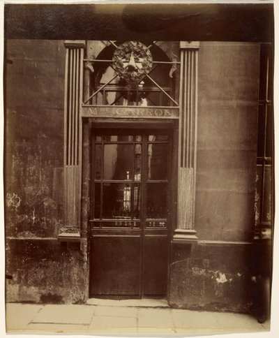 Szyld przy ulicy Notre-Dame de Bonne Nouvelle autorstwa Eugène Atget
