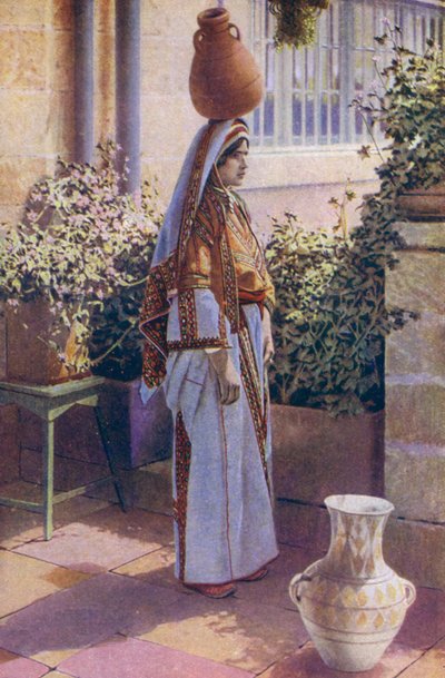 Młoda kobieta niosąca wodę na głowie w Betlejem, Palestyna (zdjęcie ilustracyjne) autorstwa European Photographer