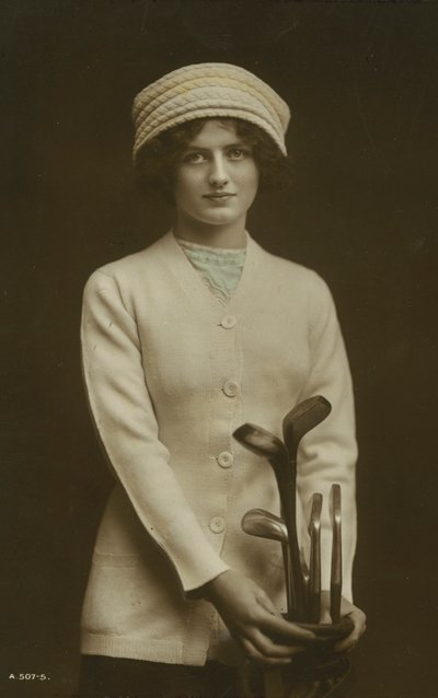 Młoda kobieta z kijami golfowymi (kolorowe zdjęcie) autorstwa European Photographer