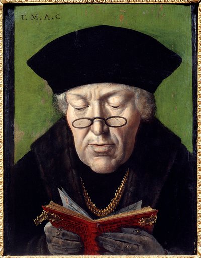 Portret Thomasa More (1478-1535), humanisty. Humanista jest reprezentowany w okularach czytając książkę. Malarstwo flamandzkiej szkoły autorstwa Flemish School